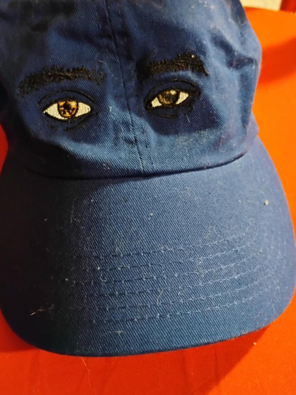 Kids Navy Hat with Embroidered Eye Detail